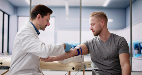 Patient Blood Draw By Doctor. People Donate