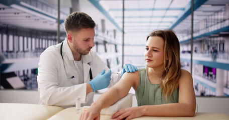 Doctor Making Vaccine Injection - obrazy, fototapety, plakaty