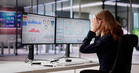 Unhappy Overwhelmed Business Woman Looking At Dashboard