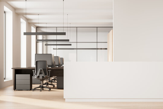 Light office room interior with white reception desk and coworking space, window