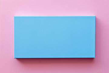 blank blue rectangular canvas hanging on a pink wall background Generative AI