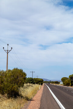 Country bitumen highway and powerlines
