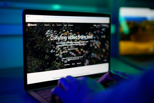 OpenAI Sora new text to video AI model illustration on screen. Man working with ChatGPT. Sora is an AI model that can create realistic and imaginative scenes