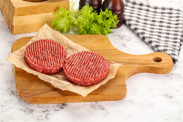 Raw beef  burger cutlet for grill
