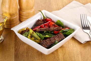 Salad with grilled beef steak