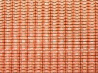 Modern architectural brickwork made of orange bricks