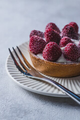 A cake with berries. Tartlet with raspberries