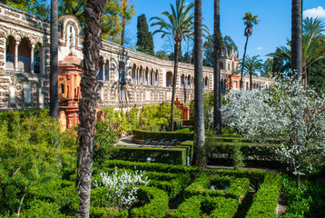the splendid gardens of the Real Alcazar in the center of Seville still Mudejar architecture