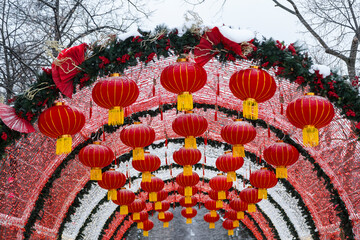 Chinese New Year in Moscow. Decorative tunnel with red decorative lanterns on Tverskoy Boulevard - 738608159