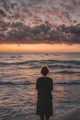 Fototapeta premium A woman standing at a beach during sunset ai generation