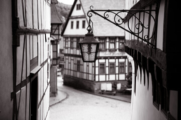 A picturesque half-timbered house next to an old street lantern gives the village a charming flair...