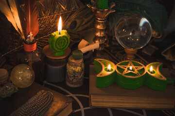 Altar of modern witch. Candles and oracle stuff on a table. Mental work with energetic. Some rite and fate prediction illustration