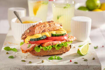 Healthy sandwich with curry chicken, cheese and chive.