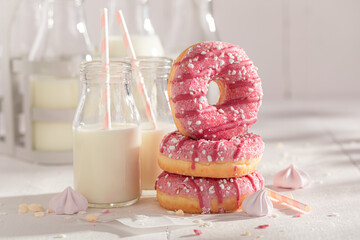 Sweet and delicious pink donuts ready to eat.