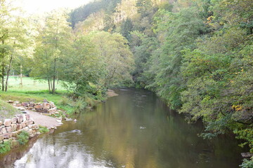 river in the Ardennes during autumn - obrazy, fototapety, plakaty