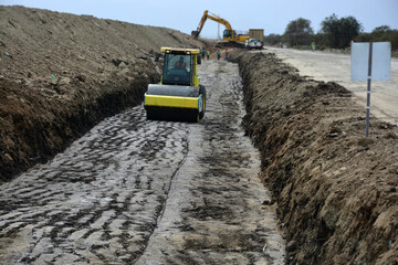 construction machines at works, dozer, roller machine, excavator, crawler rock drill machine,...