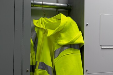 Yellow high vis jacket hanging