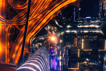 Aerial top view of amazing highway in Dubai, neon color