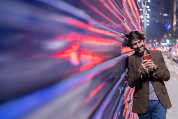 View of a young man with smartphone