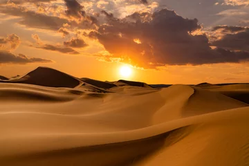 Tuinposter Sunset over the sand dunes in the desert. Rub' al Khali desert © Anton Petrus