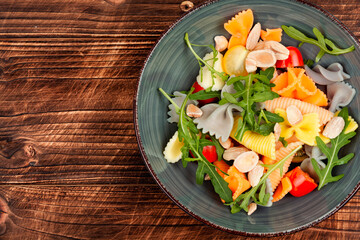 Vegetable salad with pasta.