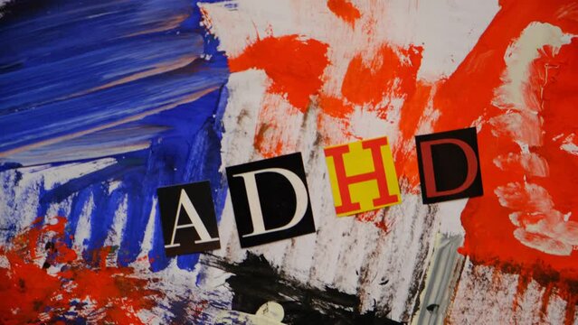 ADHD text. Abbreviation ADHD from paper letters . Colorful art background. ADHD is Attention deficit hyperactivity disorder
