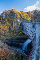 日本　北海道札幌市南区定山渓にある豊平峡ダムの放流とダムから見える渓谷と紅葉