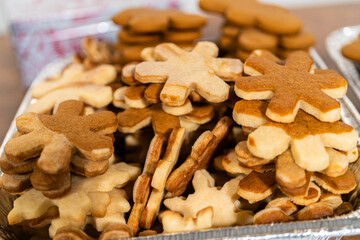 Making Festive Gingerbread Sandwiches on Rustic Wooden Table