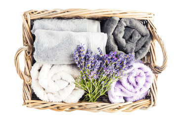 Fototapeta na wymiar erry towels and dried lavender in a wicker basket