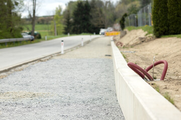 Road works, preparation of the sidewalk for asphalt coating
