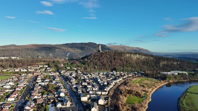 Drone footage of Cornton district with the National Wallace Monument in the background, Scotland, UK