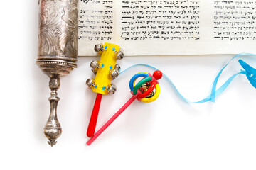 The Scroll of Esther and Purim Festival objects on white background.