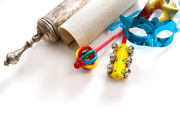 The Scroll of Esther and Purim Festival objects on white background.