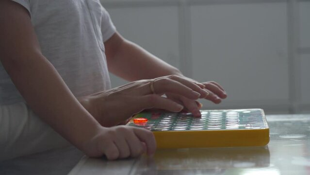 mother and child learning alphabet on smarty alphabet tablet to learn letters, ABC, numbers, shapes, colors, music and words. Interactive toddler learning and education toys for kids boys and girls