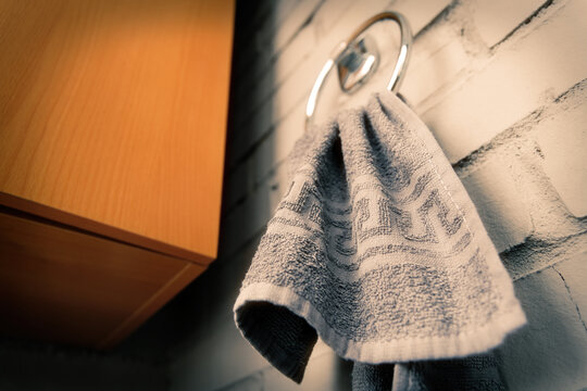 Close-Up View of a Hanging Towel on a Modern Bathroom Ring