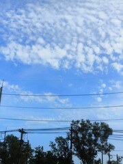 power lines of blue sky