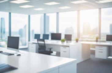 Fototapeta premium Blurred empty modern office. Defocused abstract light bokeh business eco open space interior background design. Corporate strategy, finance, operations, marketing. Tables with computers blur focus