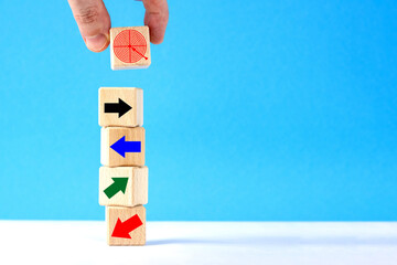  Hand. Wooden cubes with arrows.