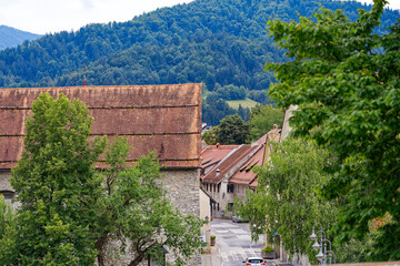Old town with historic houses and road at City of Skofja Loka on a cloudy summer day. Photo taken...