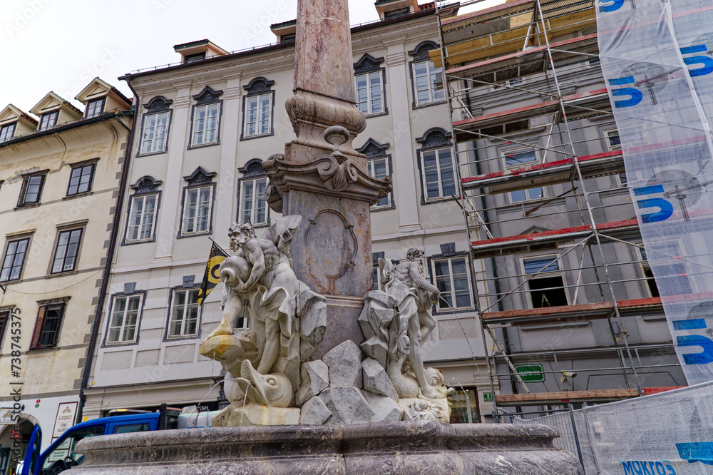 Wall mural Famous fountain of the three Carniolan Rivers made by Francesco Robba at the old town City of Ljubljana on a cloudy summer day. Photo taken August 9th, 2023, Ljubljana, Slovenia.