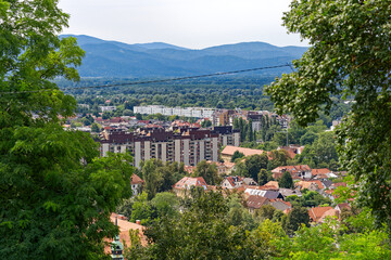 Aerial view of City of Ljubljana seen from Sance castle hill with mountain panorama in the...