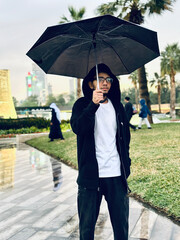 person walking with umbrella