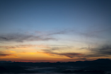 Beautiful skyline in sunrise over mountains