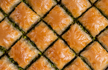 Close up top view of sliced pistachio baklava.