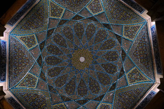 Shiraz, Iran - 06.26.2023: The Tomb of Saadi, commonly known as Saadieh, Low angle view of dome of the tomb of saadi.
