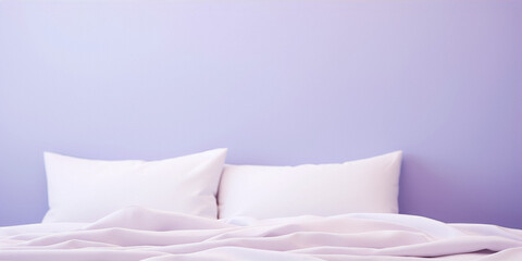 White pillows and blanket on the bed with purple background