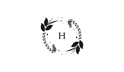 Circular Decoration of leaves Alphabetical logo