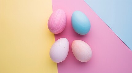 a group of eggs on a pink and yellow background