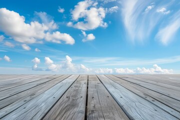 An idyllic winter scene captured on a wooden deck, with billowy clouds and a snowy landscape blending seamlessly into the serene blue sky
