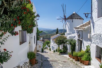 Small Spain town with old windmill